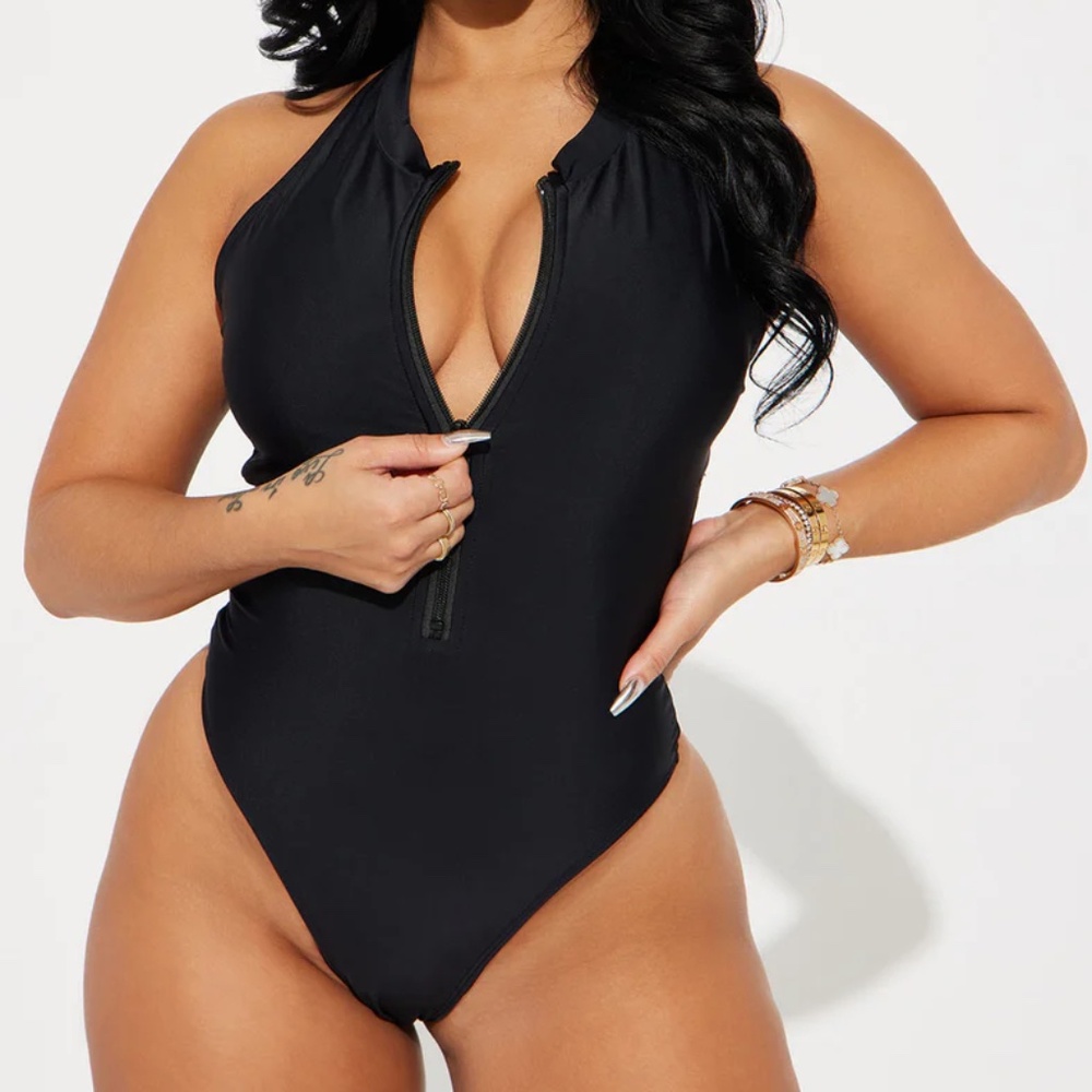 Never Used- Brand New with tags- One Piece Swimsuit